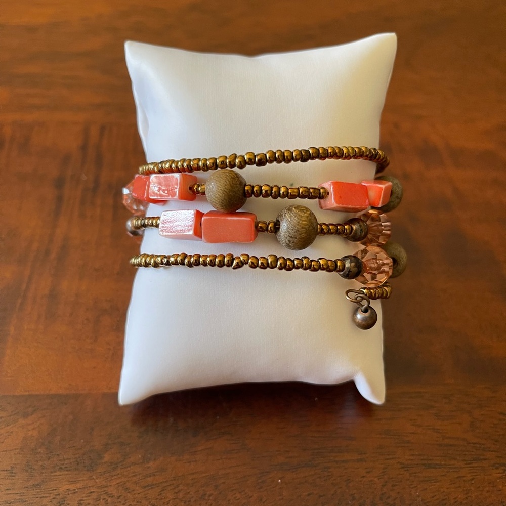 Memory wire bracelet glass seed beads plastic and wood beads orange and bronze